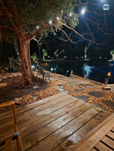 Boardman Lawncare nighttime pond, fountain and landscape lighting